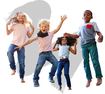 Four joyful children are jumping against a solid black background, expressing excitement and playfulness, with bright clothing enhancing their energetic poses.